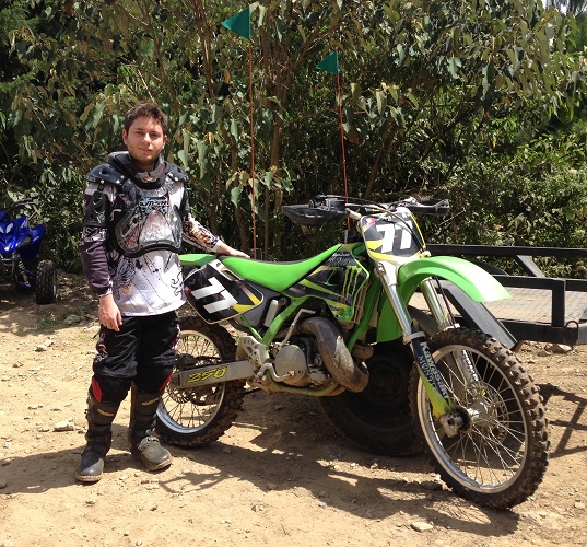 Image of Juan Gomez and a dirt bike